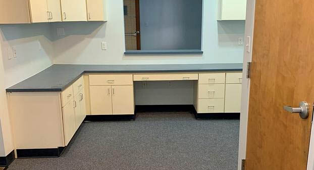 Office with built-in cabinets