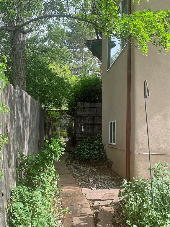 gated pathway to back yard